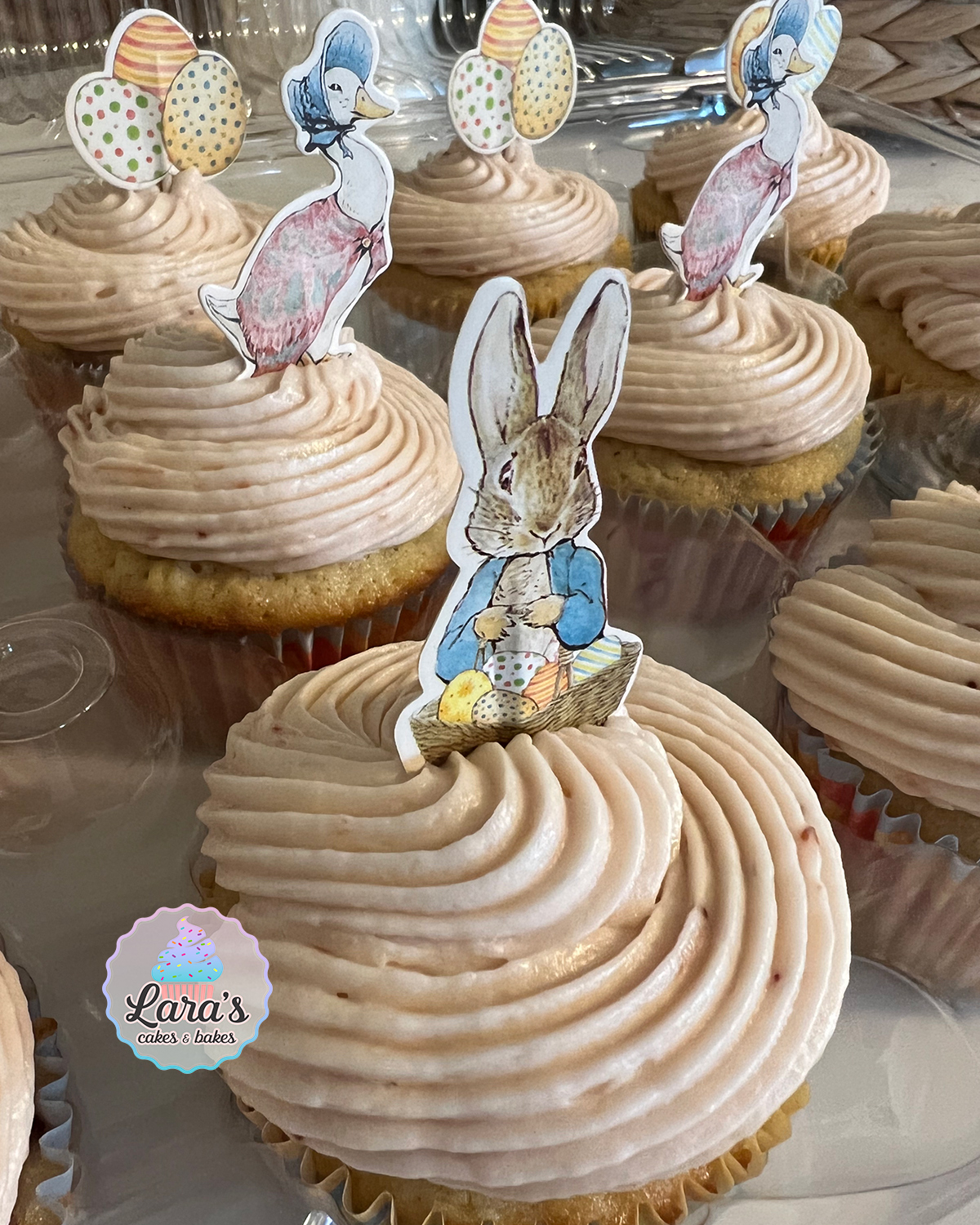Fresh strawberry cupcakes with strawberry buttercream and Peter Rabbit toppers