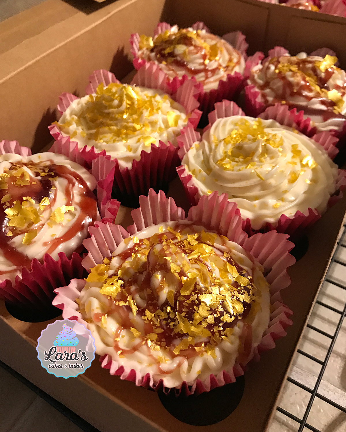 Red wine reduction cupcakes with gold flakes